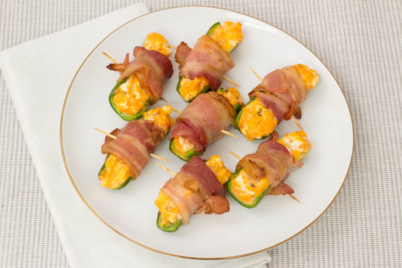 Jalaeno poppers on a white plate 