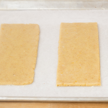 Dough rolled into rectangular shape.