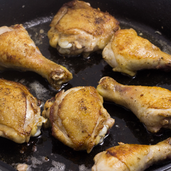 chicken browning in skillet