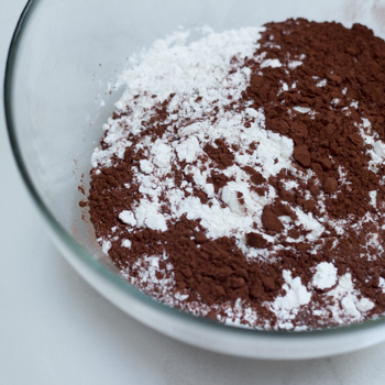 Flour, cocoa, and cornstarch together in a bowl.