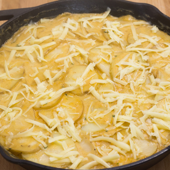 skillet and potatoes with cheese