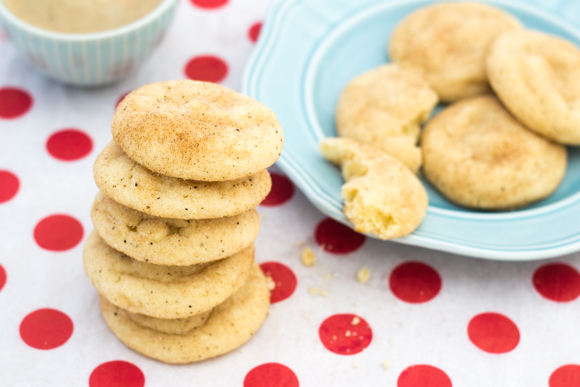 snickerdoodle cookies in a stack, on a red and white polka dot tablecloth