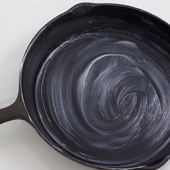 greasing the cast iron pan